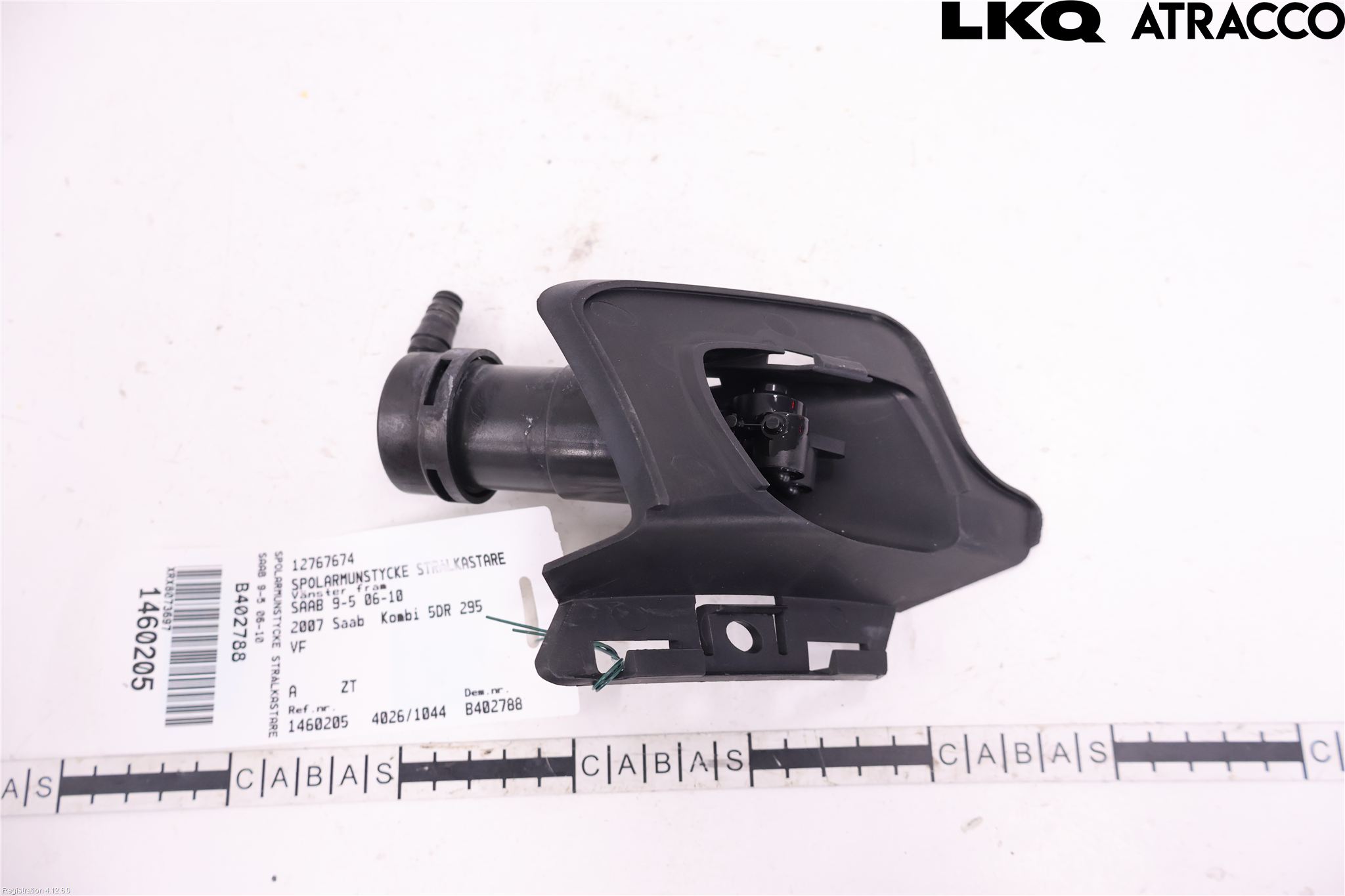 Saab 9-5     06-10 Spolarmunstycke Strålkastare