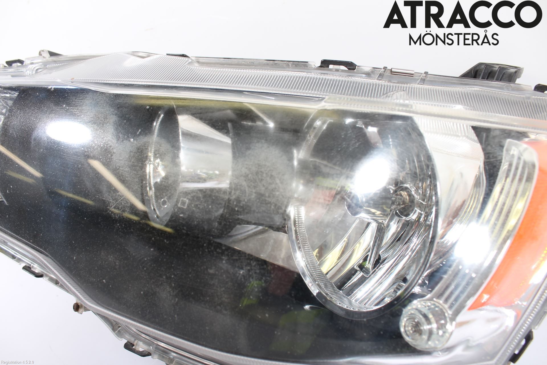 Mitsubishi LANCER 07-14 Strålkastare Vänster