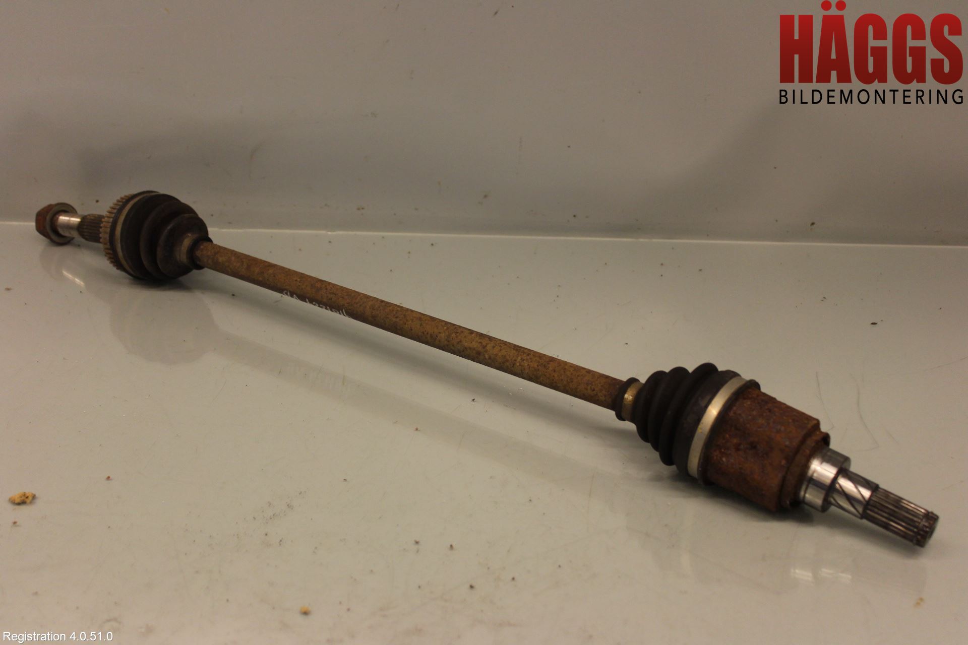 Nissan QASHQAI+2  10-14 Drivaxel Bak Vänster