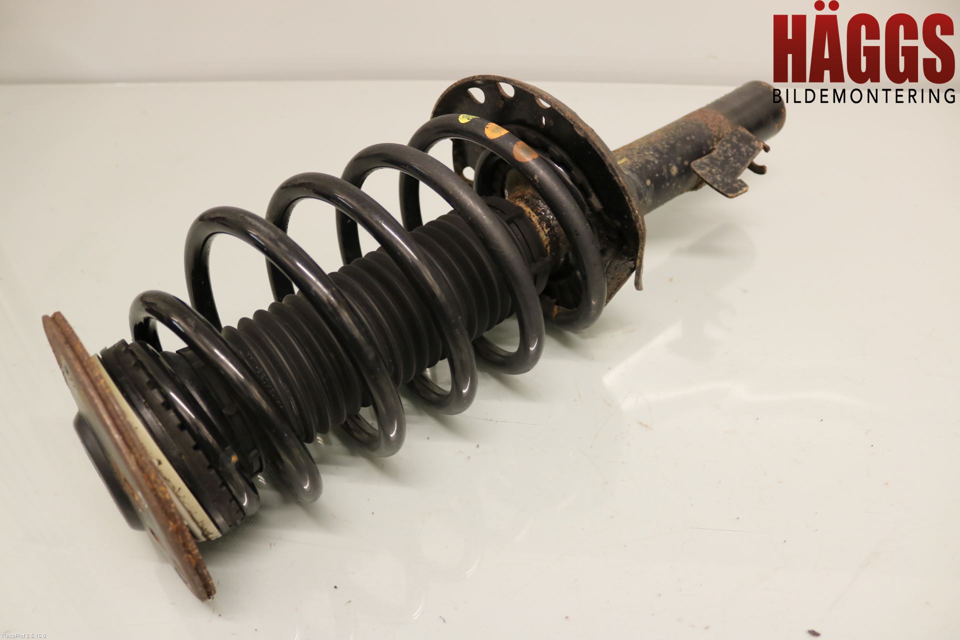 Volvo XC70 08-13 Fjäderben Fram Vänster