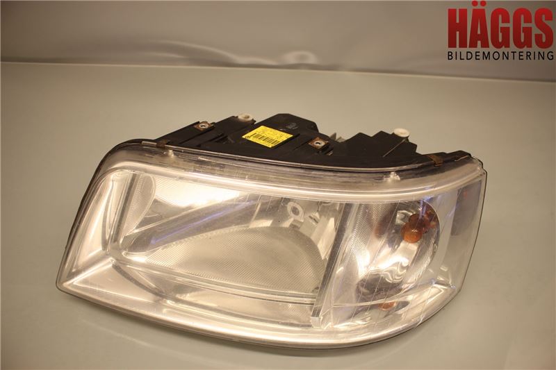 Volkswagen VW TRANSP/CARAVELLE (T5) 04-15 Strålkastare Vänster