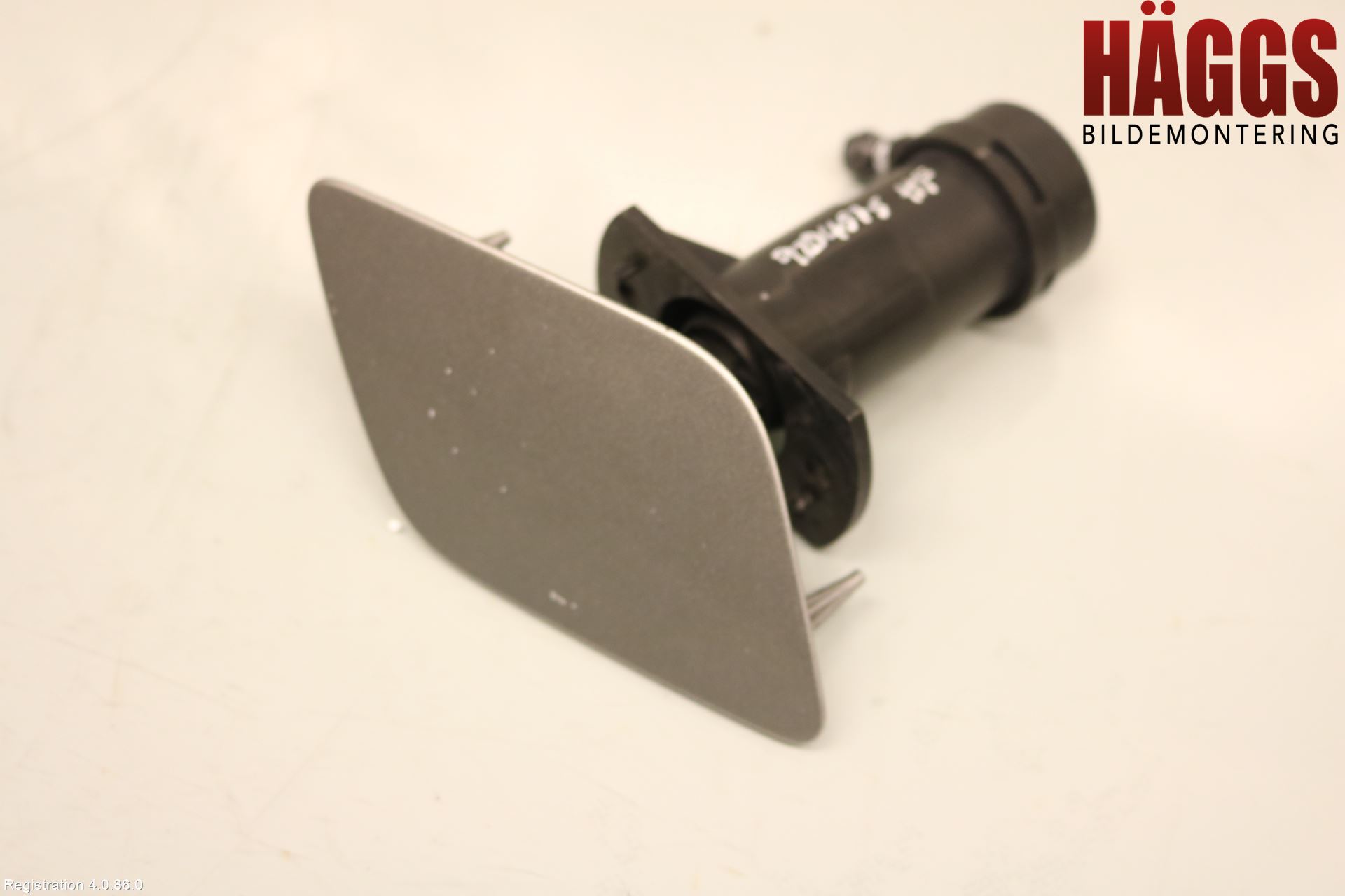 Audi A6/S6     05-11 Spolarmunstycke Strålkastare