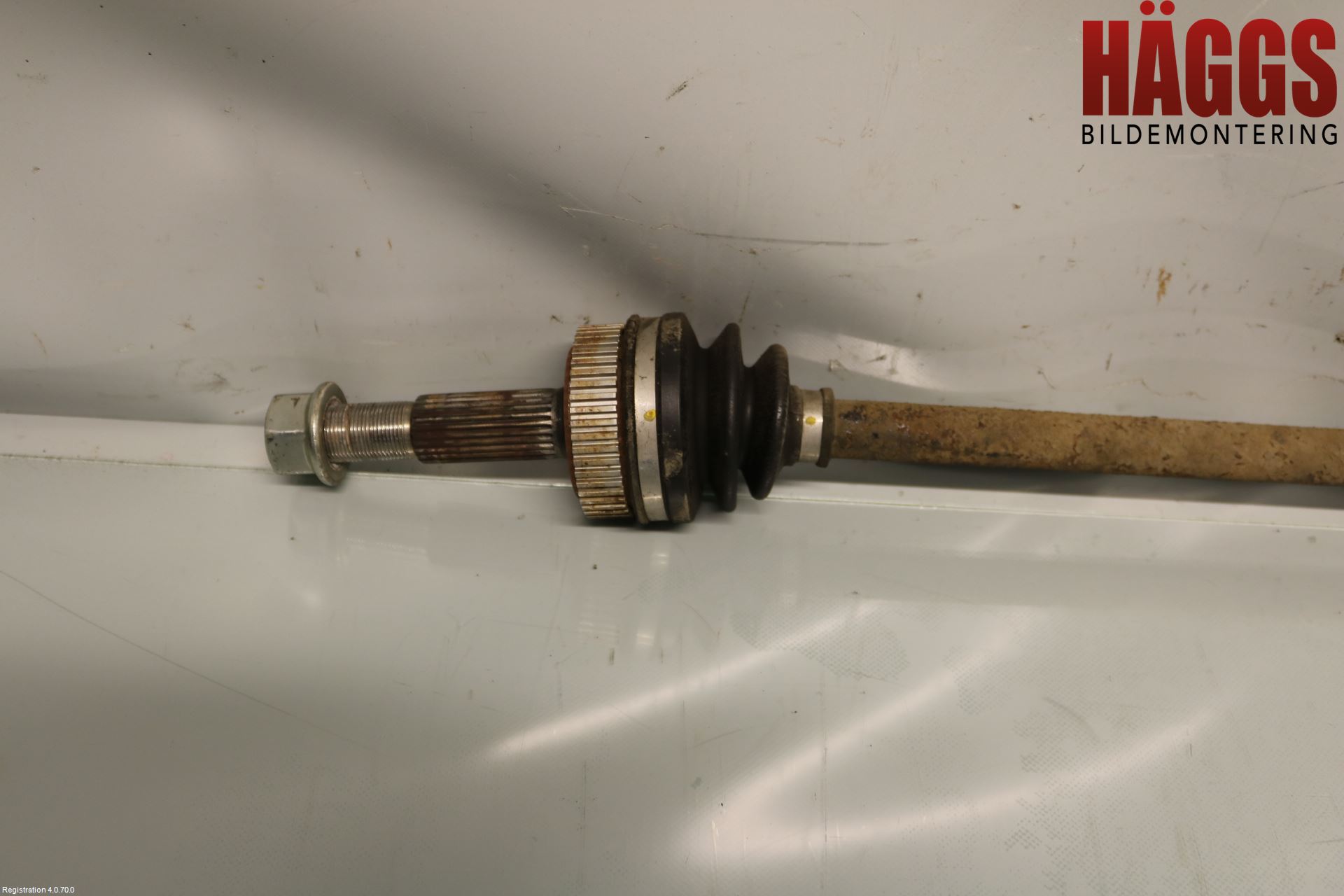 Nissan QASHQAI+2  10-14 Drivaxel Bak Vänster