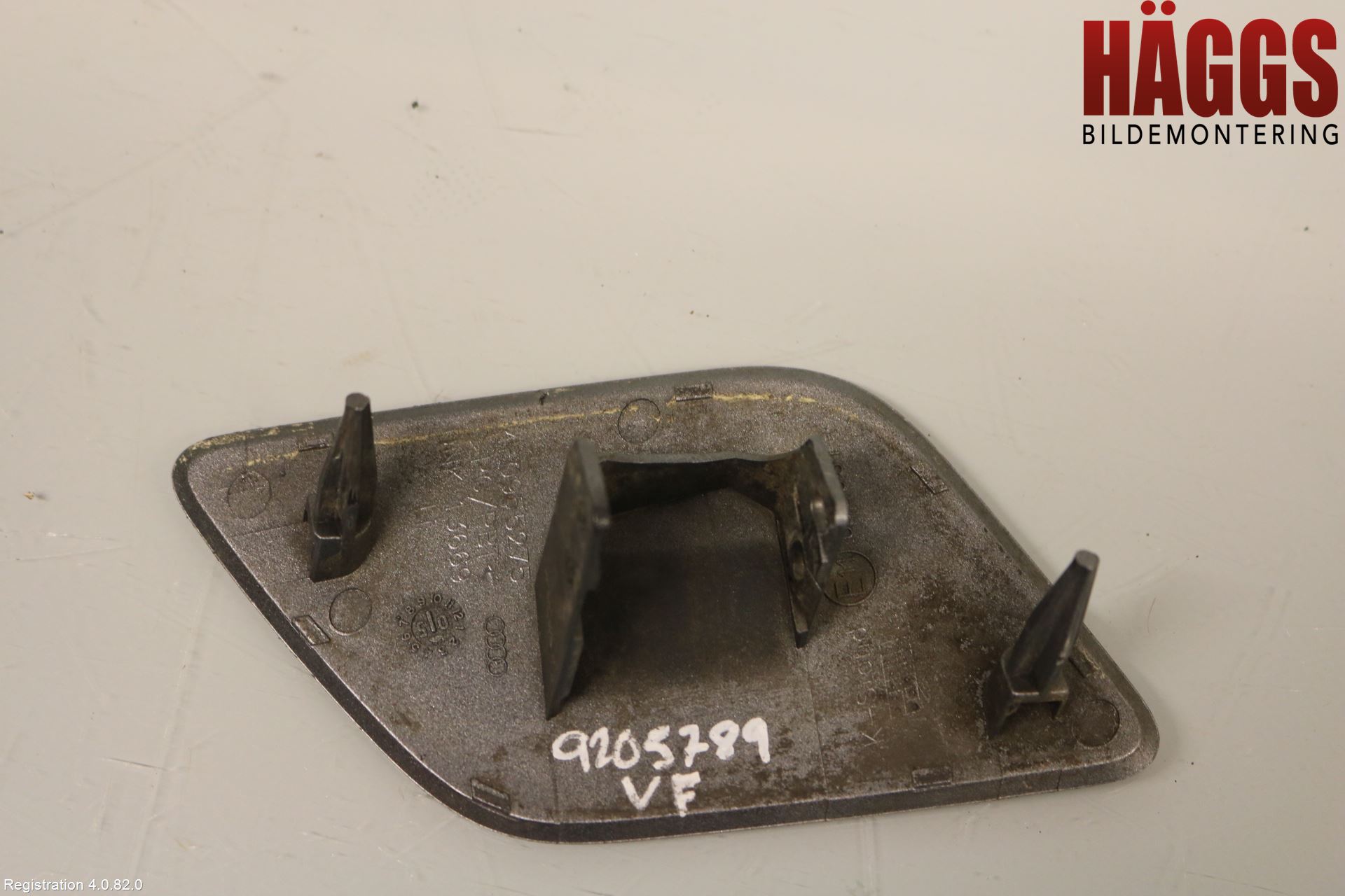 Audi A6/S6     05-11 Spolarmunstycke Strålkastare