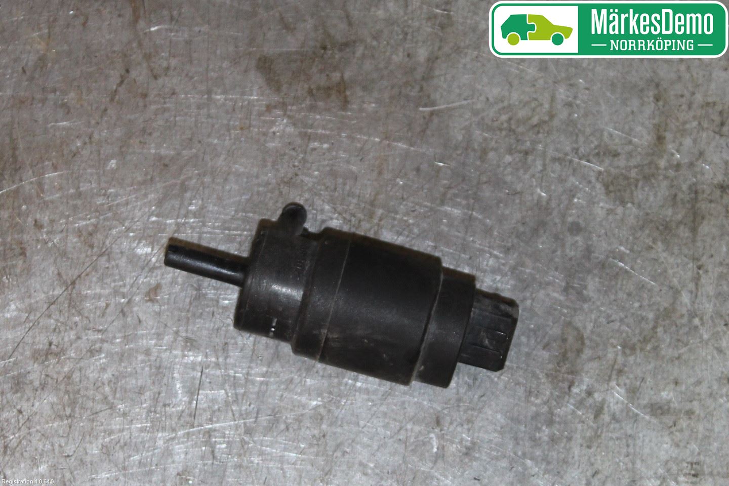 Saab 9-5     06-10 Spolarpump Baklucka