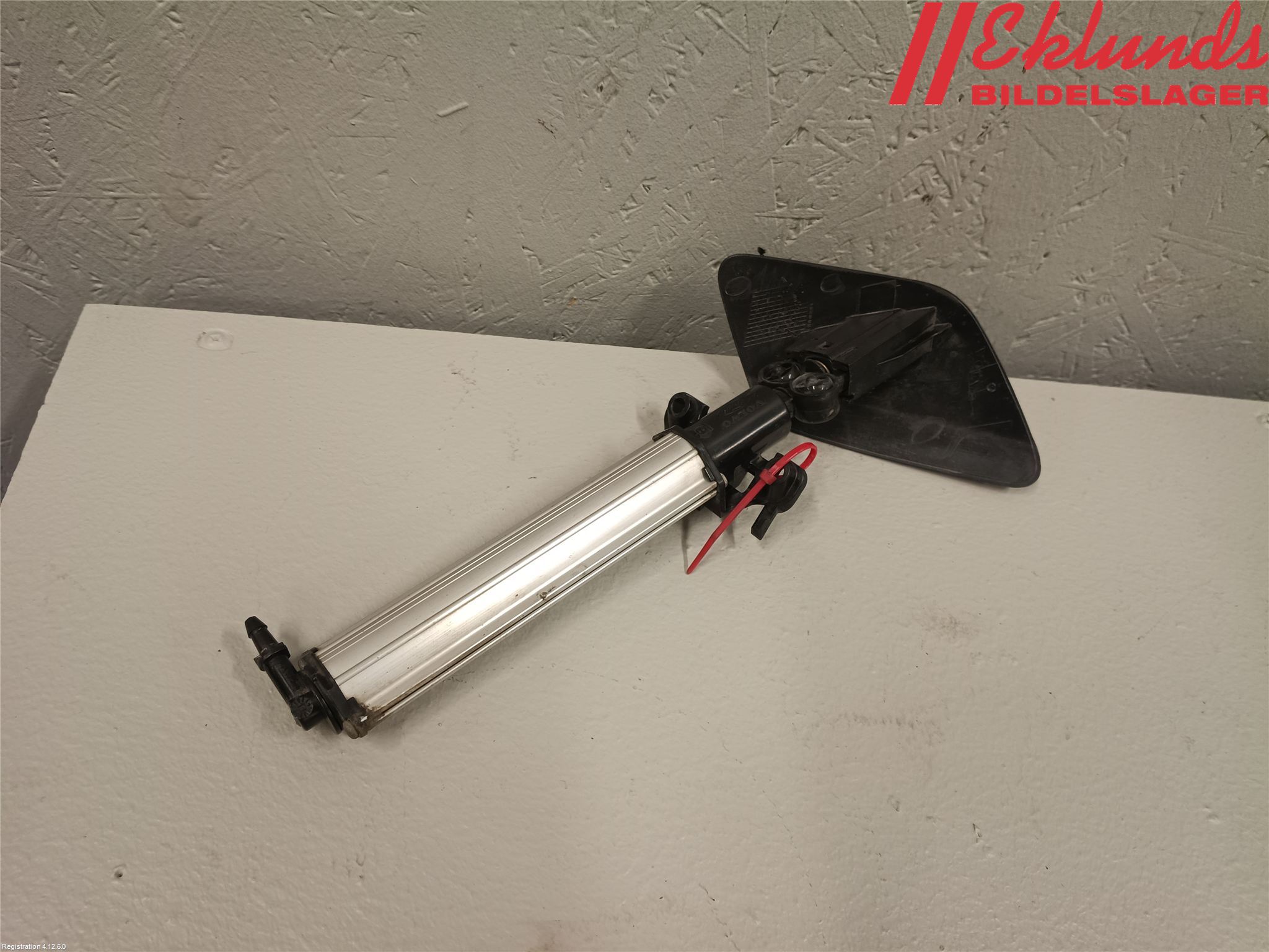 Volvo V60 11-13 Spolarmunstycke Strålkastare