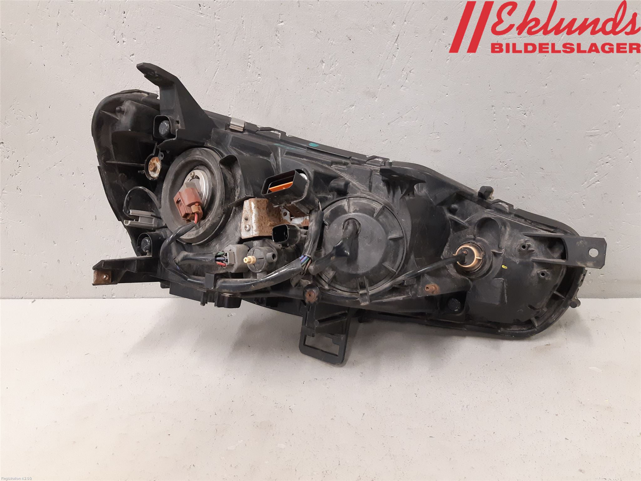 Mitsubishi LANCER 07-14 Strålkastare Vänster