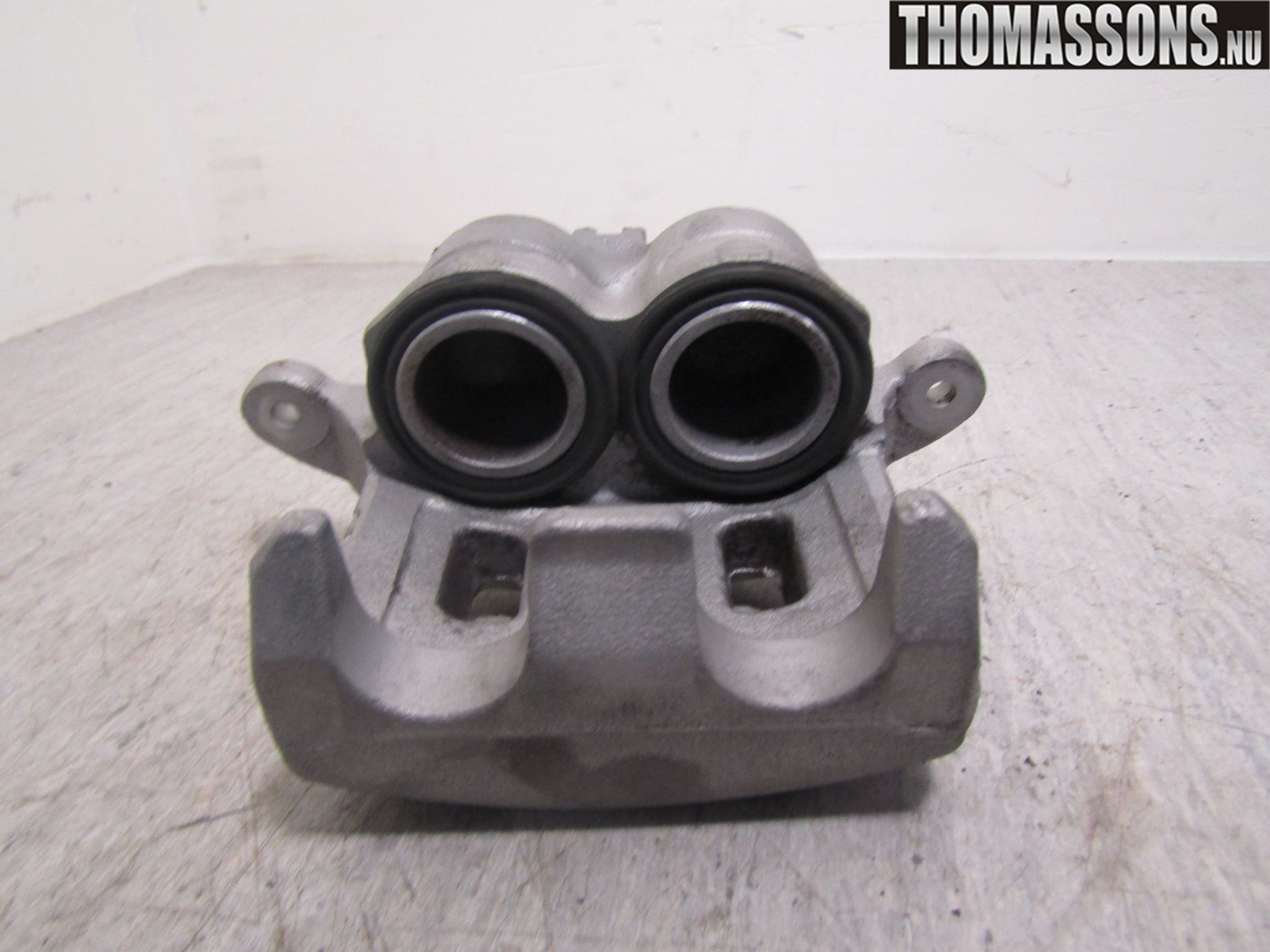 Nissan QASHQAI+2  10-14 Bromsok Fram Vänster