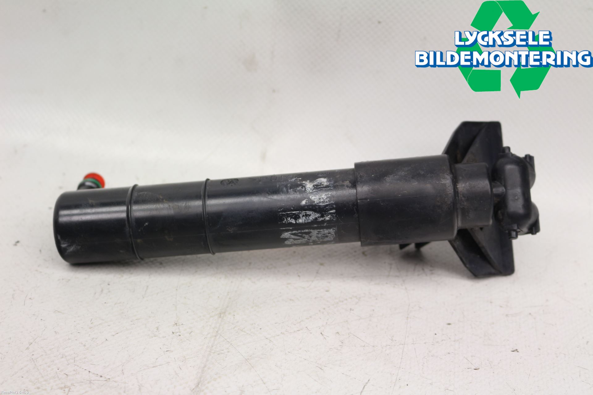 Ford FOCUS     04-07 Spolarmunstycke Strålkastare