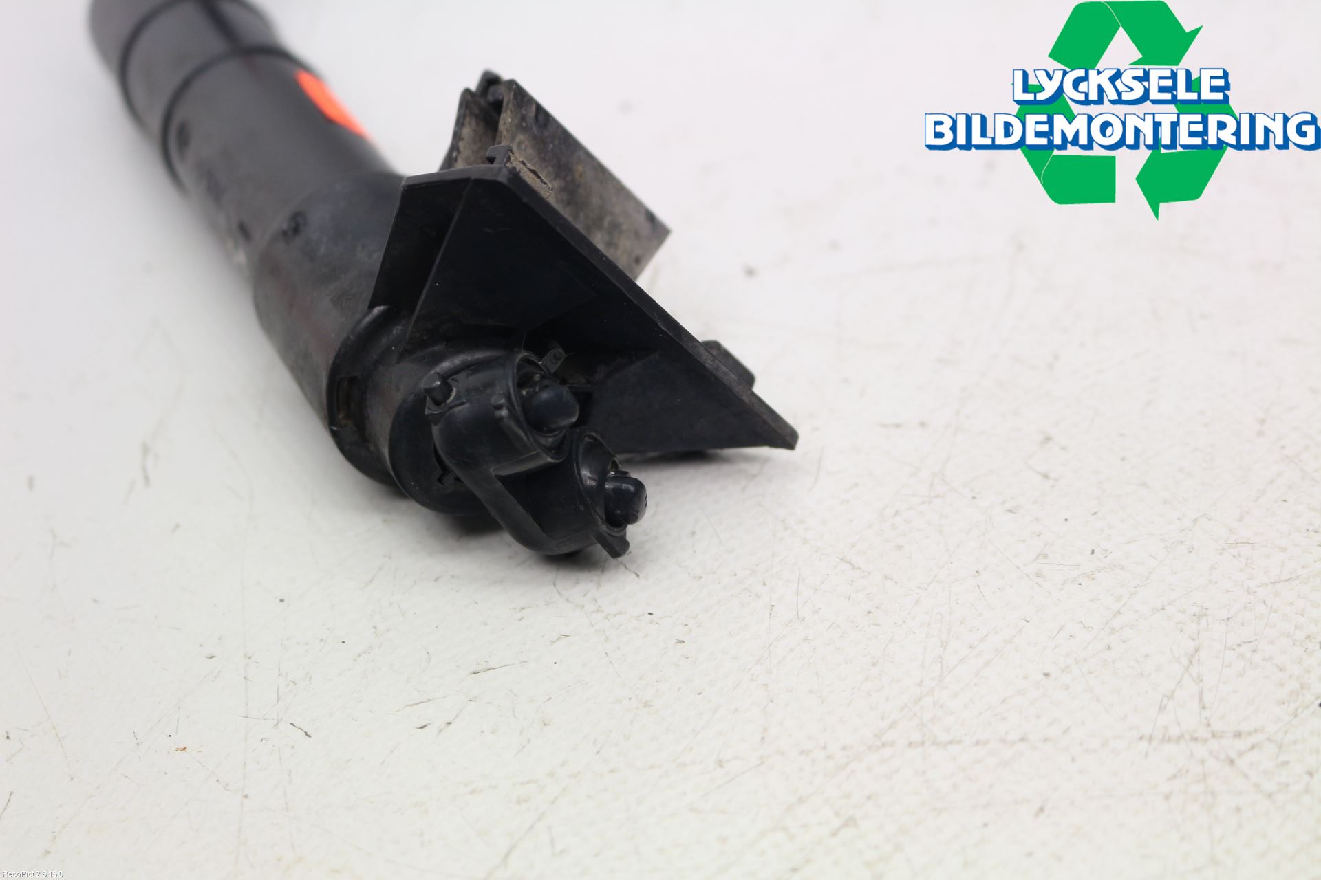 Ford FOCUS     04-07 Spolarmunstycke Strålkastare