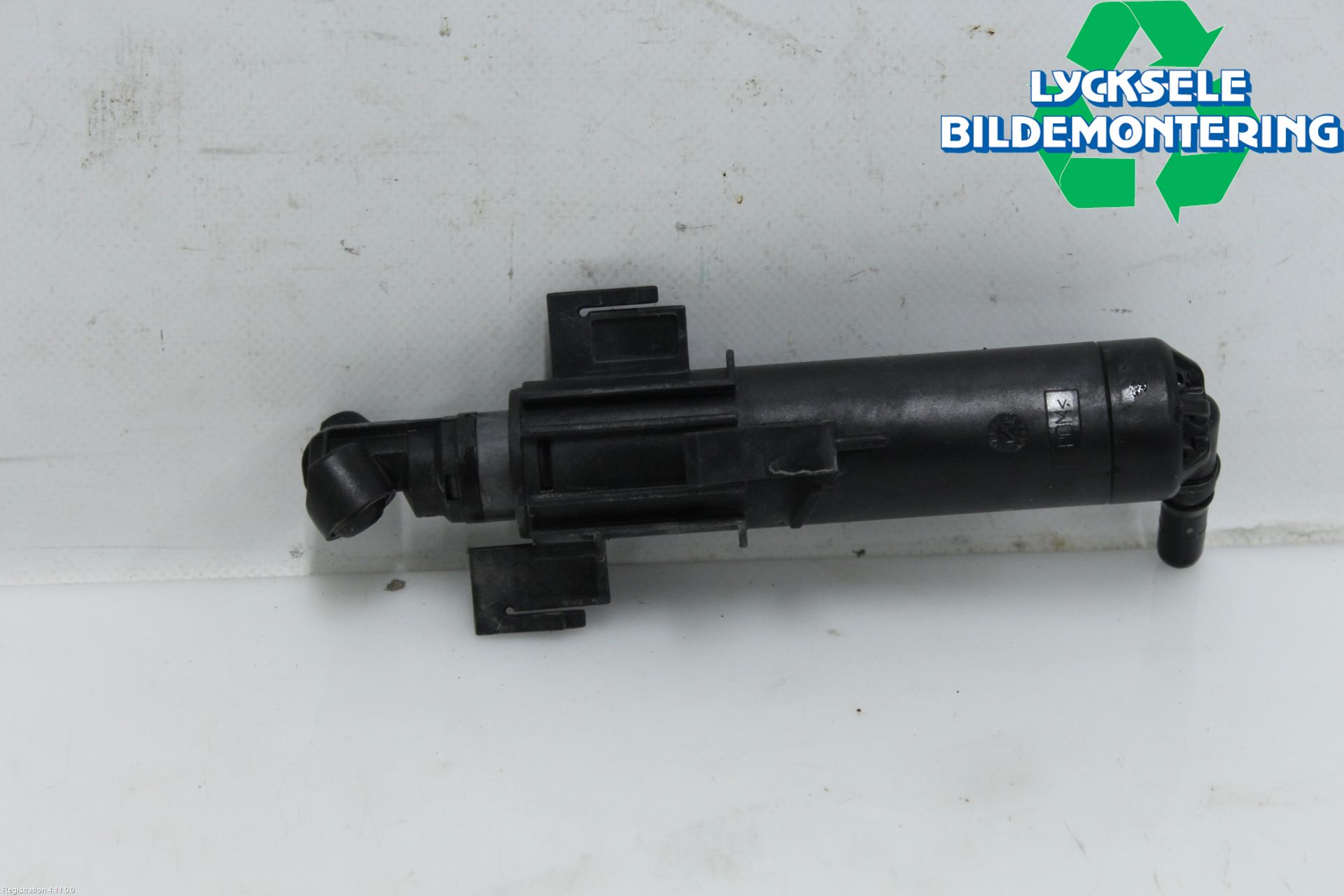 Audi A4 12-15 Spolarmunstycke Strålkastare