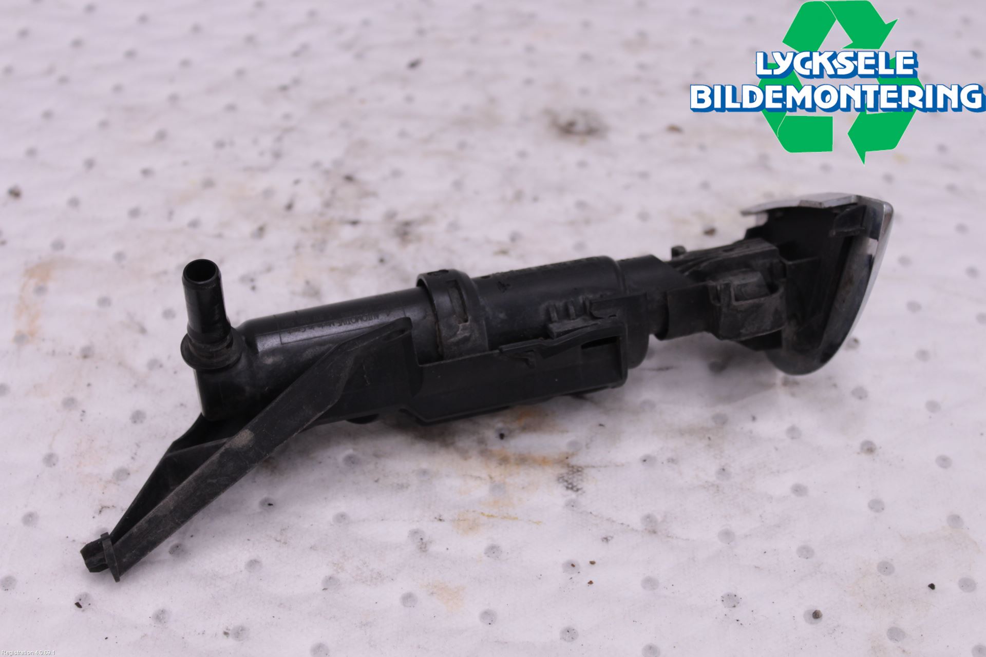 Mini COUPE R56 05-14 Spolarmunstycke Strålkastare