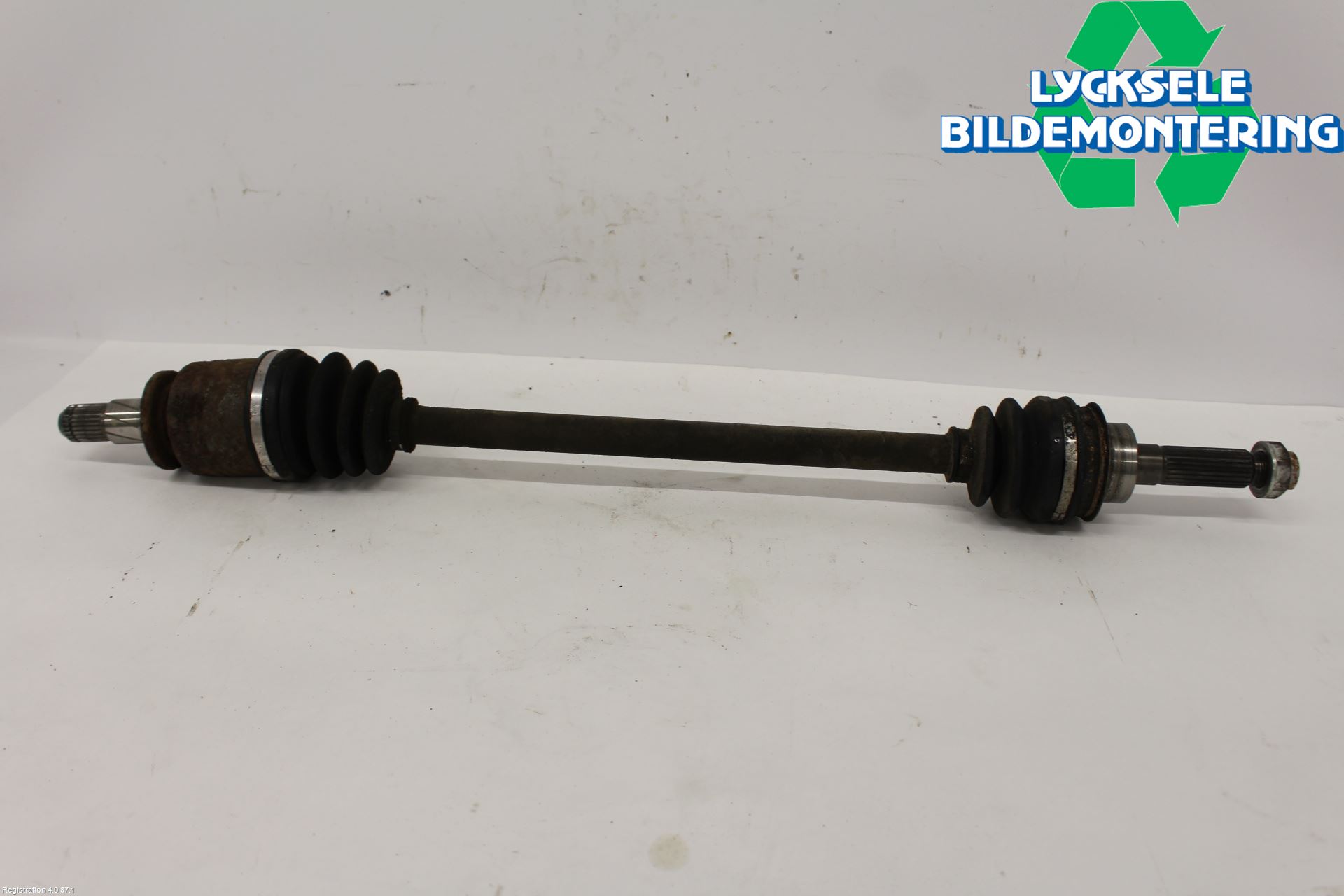 Subaru IMPREZA II  01-02 Drivaxel Bak Vänster
