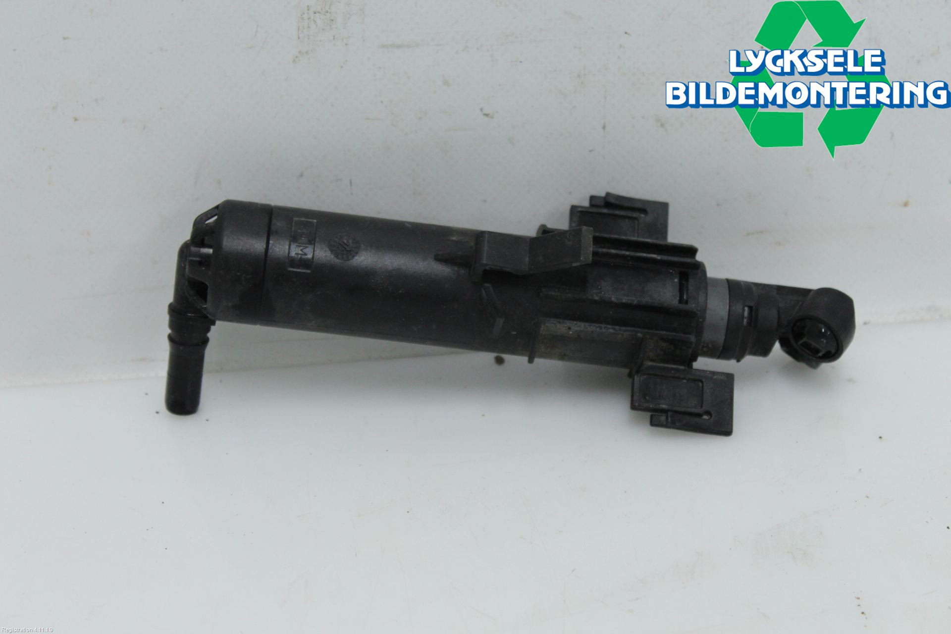 Audi A4 12-15 Spolarmunstycke Strålkastare