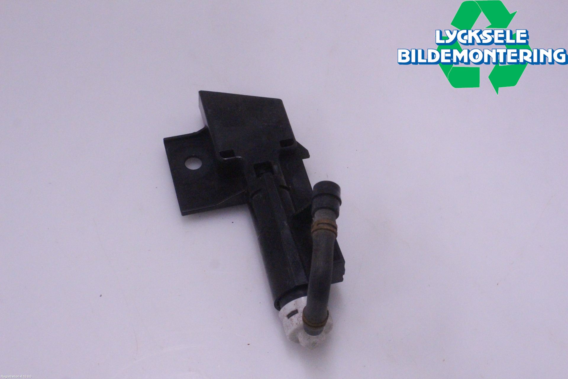 Subaru OUTBACK 10-15 Spolarmunstycke Strålkastare