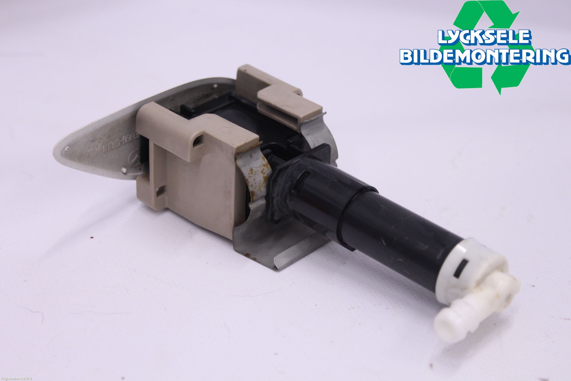 Mazda CX-7 Spolarmunstycke Strålkastare