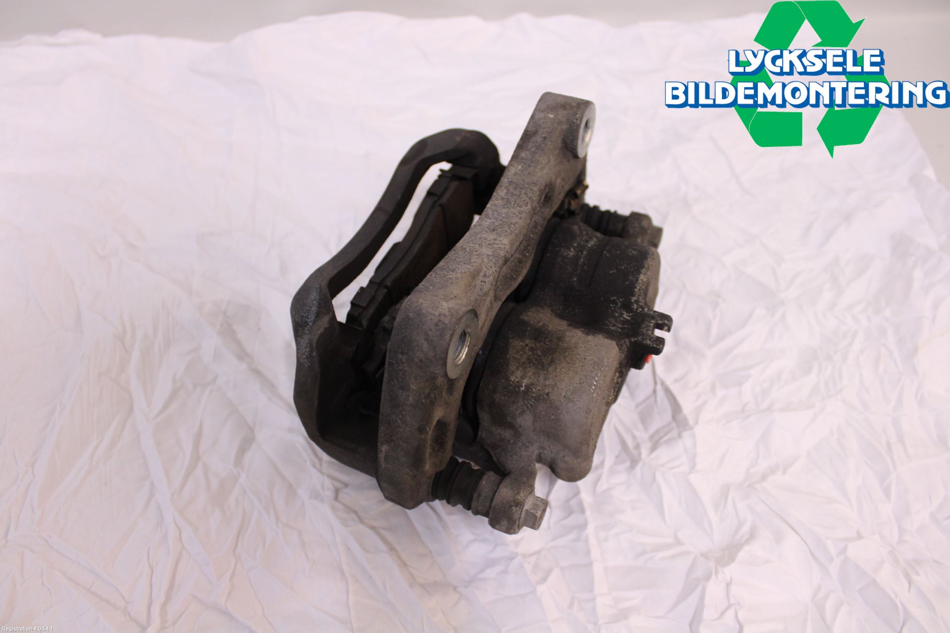 Nissan QASHQAI+2  10-14 Bromsok Fram Vänster