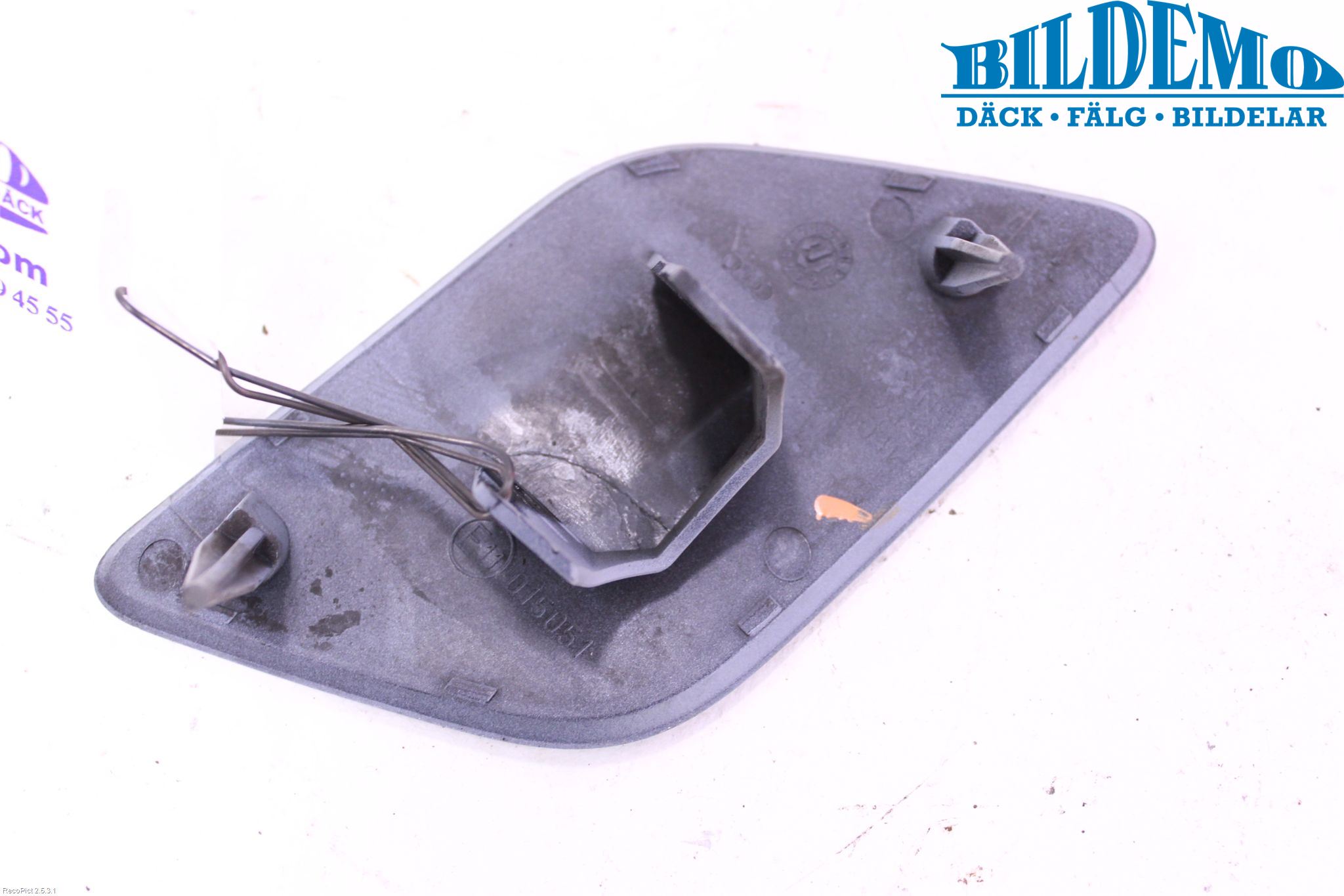 Audi A6/S6     05-11 Spolarmunstycke Strålkastare