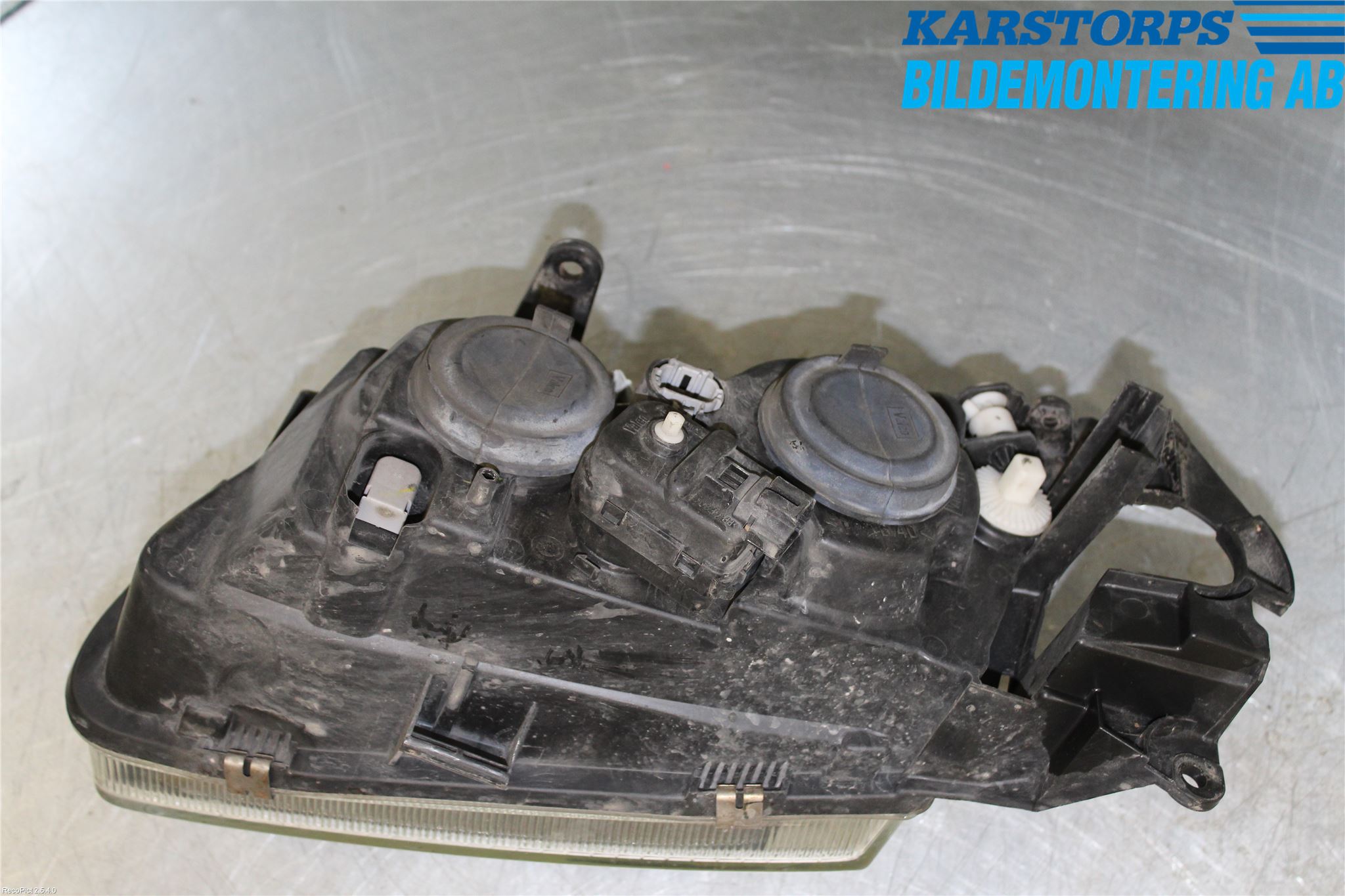 Nissan ALMERA    00-06 Strålkastare Höger